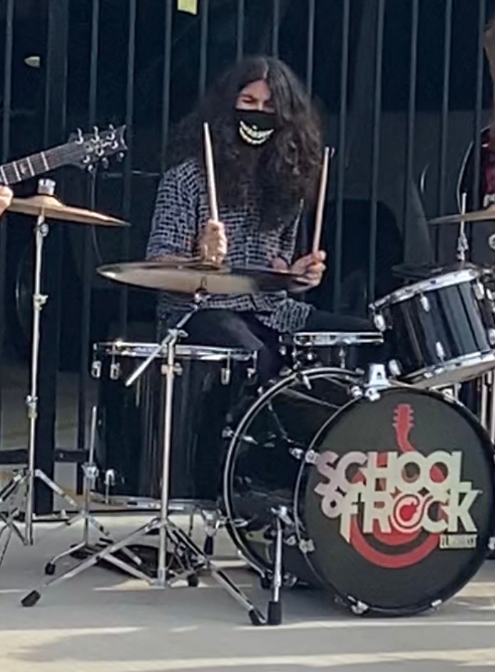 Rocco Ramos performs at a School of Rock Elmhurst event. Ramos draws his inspiration as a musician from alternative music, classic rock and nu metal.