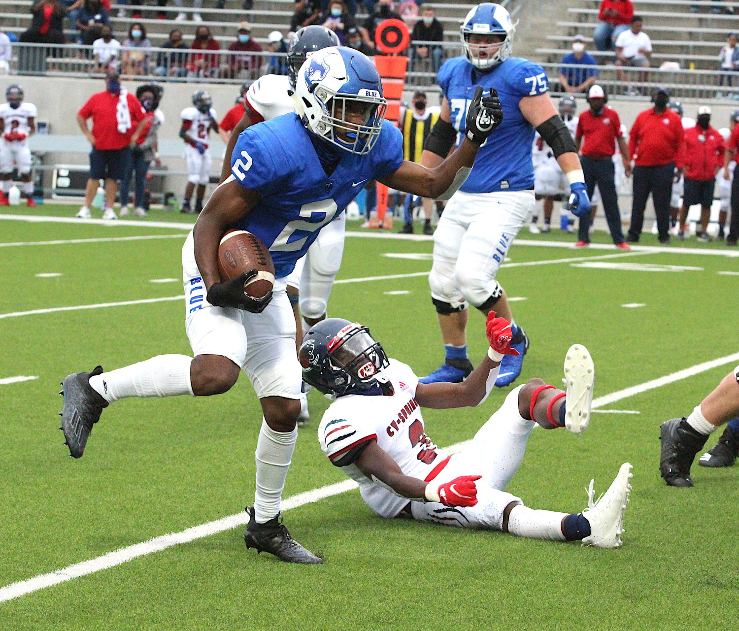 Taylor junior Michael Whitaker carries the ball during Thursday's game against Cy-Springs at Legacy Stadium.