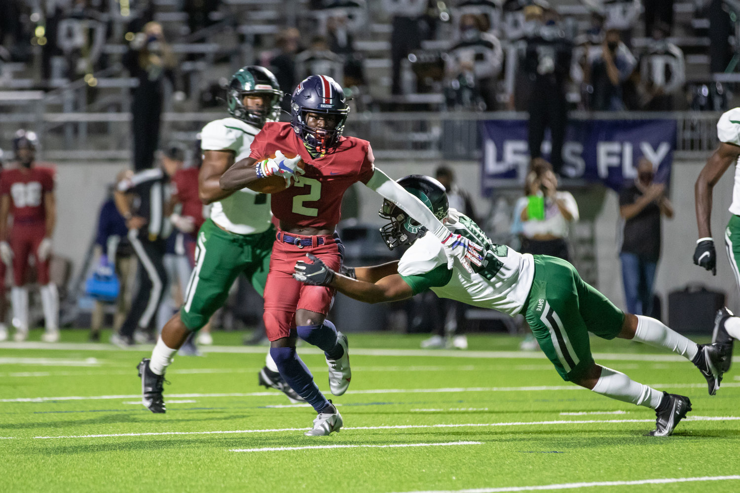 Tompkins receiver Joshua McMillan II makes a catch-and-run during the Falcons' win over Mayde Creek on Thursday evening at Legacy Stadium.