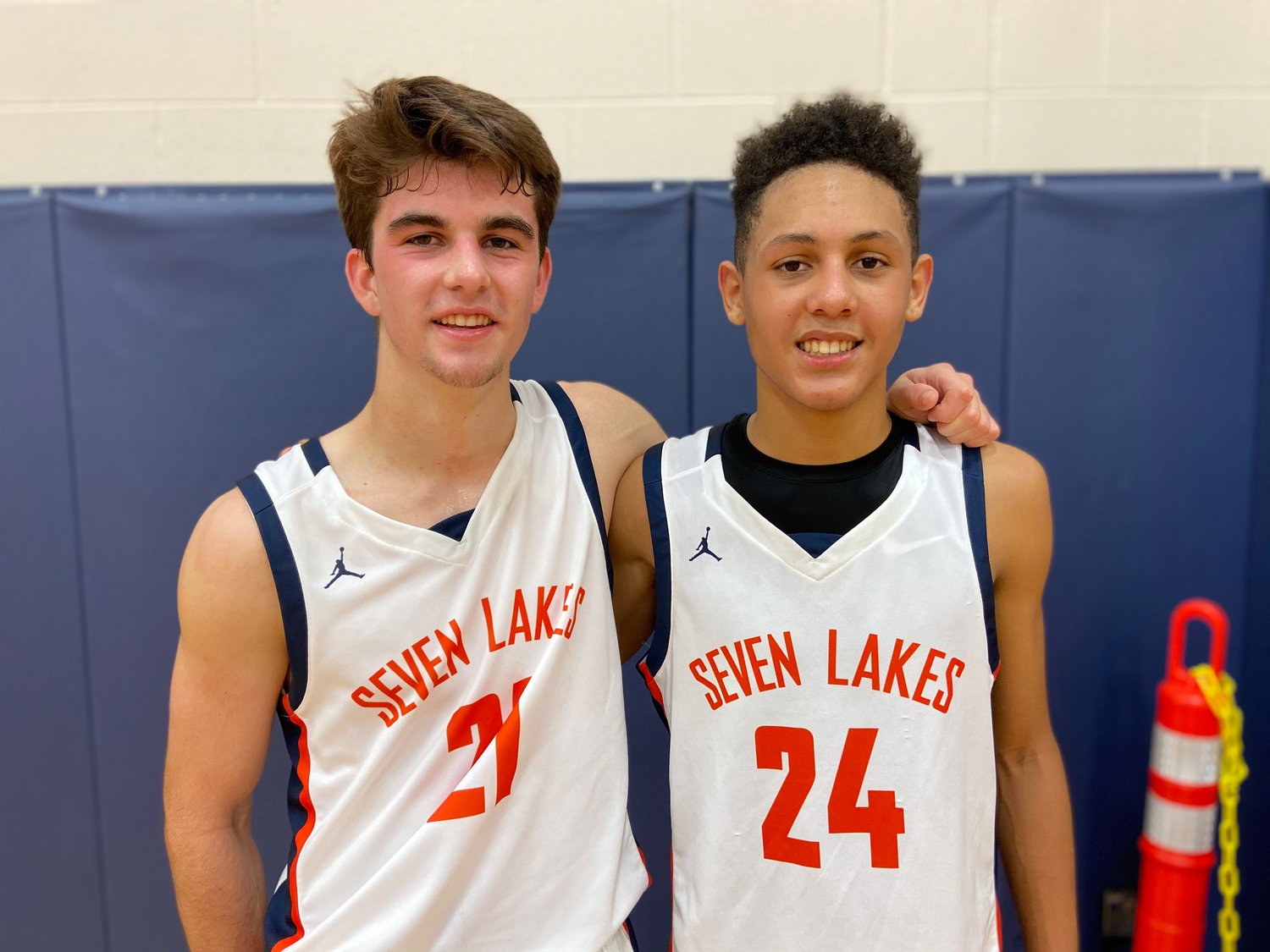 Seven Lakes senior Stinnett Prior, left, and freshman A.J. Bates were critical in the Spartans’ 58-49 win over Taylor on Tuesday that kept them undefeated in district play.