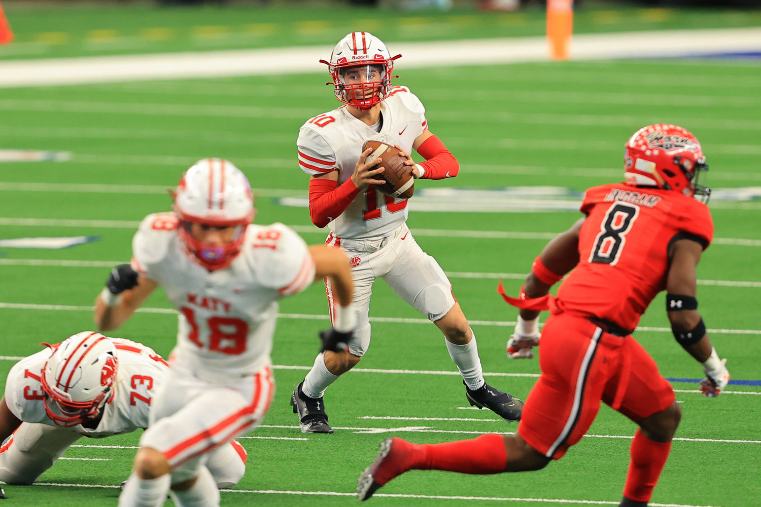 Katy sophomore quarterback Caleb Koger looks downfield during the first half of the Tigers' 51-14 win over Cedar Hill at AT&T Stadium on Saturday afternoon. Katy won the Class 6A-Division II state championship.
