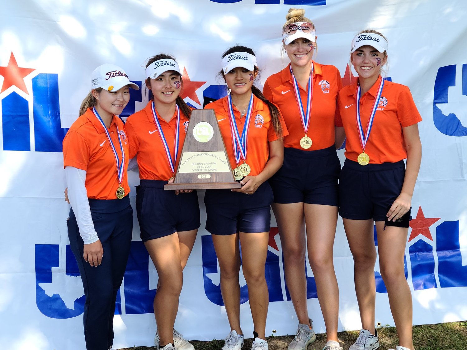 Seven Lakes’ girls won the Region III-6A team golf championship for the third straight season. Senior Lauren Nguyen, middle (holding trophy), won the individual girls title, shooting a two-day score of 137.
