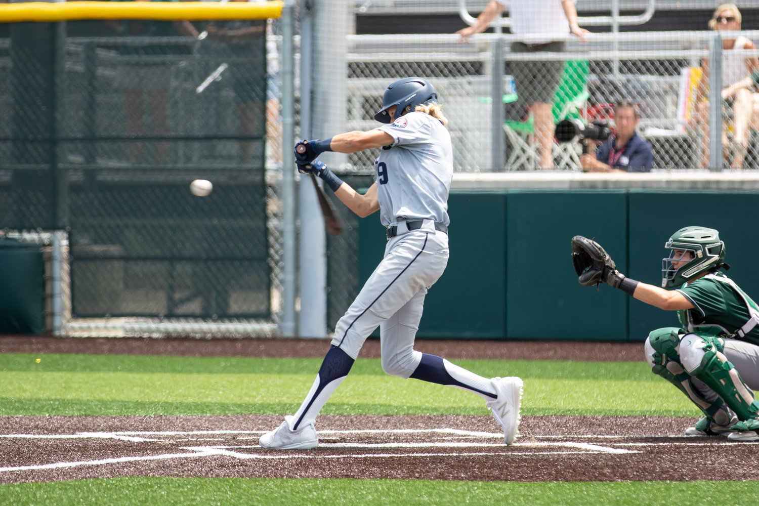 Tompkins sophomore Drew Markle takes a swing during Game 3 of the Falcons’ Region III-6A semifinals against Strake Jesuit last year at Cy-Falls High.