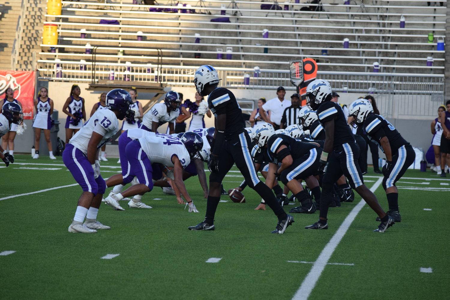 Paetow lines up to run a play against Morton Ranch during a game on Friday at Legacy Stadium.
