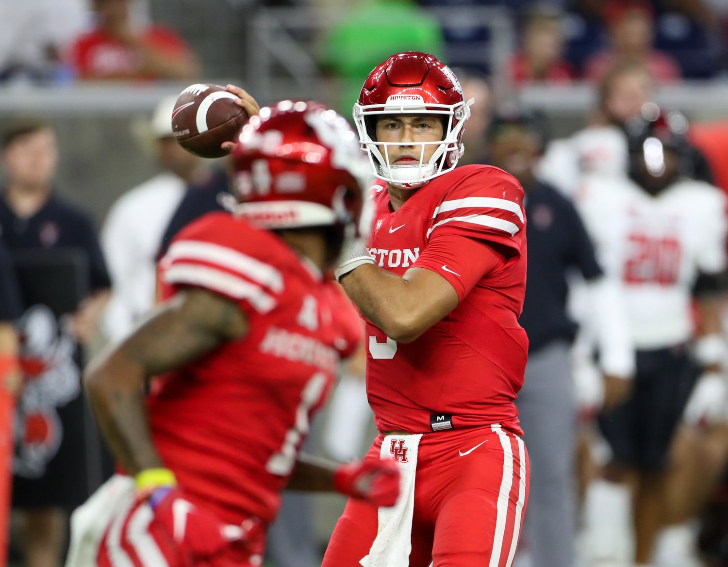 Houston Cougars quarterback Clayton Tune (3) looks to pass during an NCAA football game between Houston and Texas Tech on September 4, 2021 in Houston, Texas.