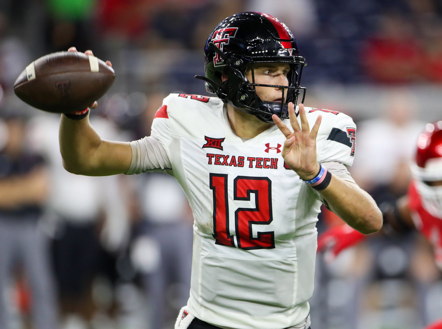 Texas Tech Red Raiders quarterback Tyler Shough (12) looks to pass during an NCAA football game between Houston and Texas Tech on September 4, 2021 in Houston, Texas.