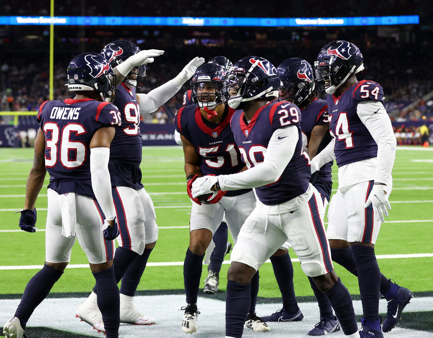 The Houston Texans defense celebrates a fumble recovery by outside linebacker Kamu Grugier-Hill (51) during an NFL preseason game between the Houston Texans and the Tampa Bay Buccaneers on August 28, 2021 in Houston, Texas.