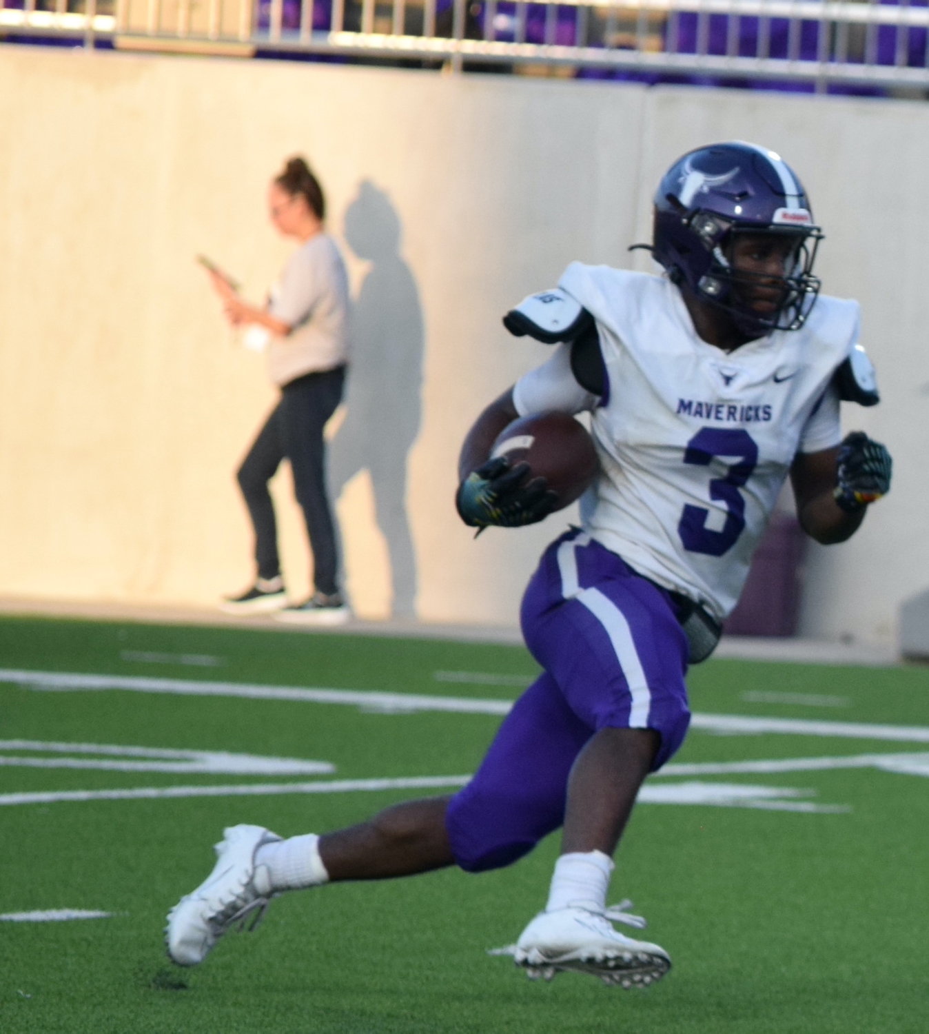 Morton Ranch's Santana Scott runs the ball during a game against Paetow on Sept. 3 at Legacy Stadium.