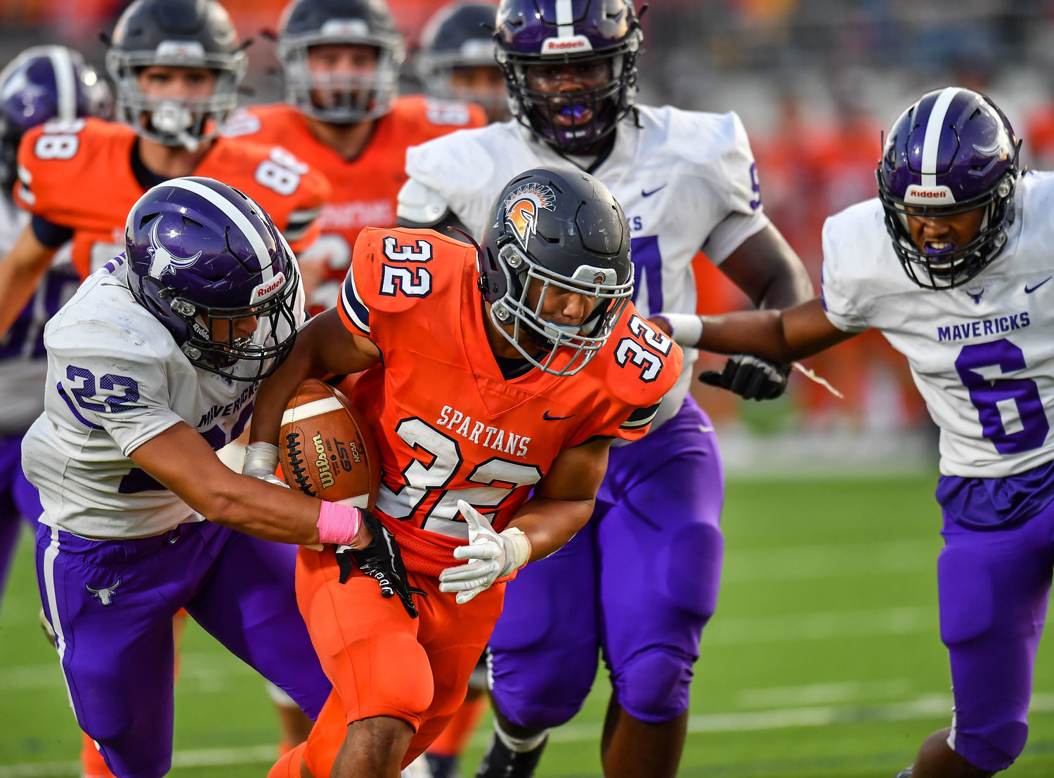 Katy, Tx. Oct. 8, 2021: Seven Lakes Michael Amico #32  avoids the stop by Morton Ranchs Carsen Luna #22 during the second half scoring a TD during a District 19-6A game between Seven Lakes and Morton Ranch at Legacy Stadium in Katy. (Photo by Mark Goodman / Katy Times)