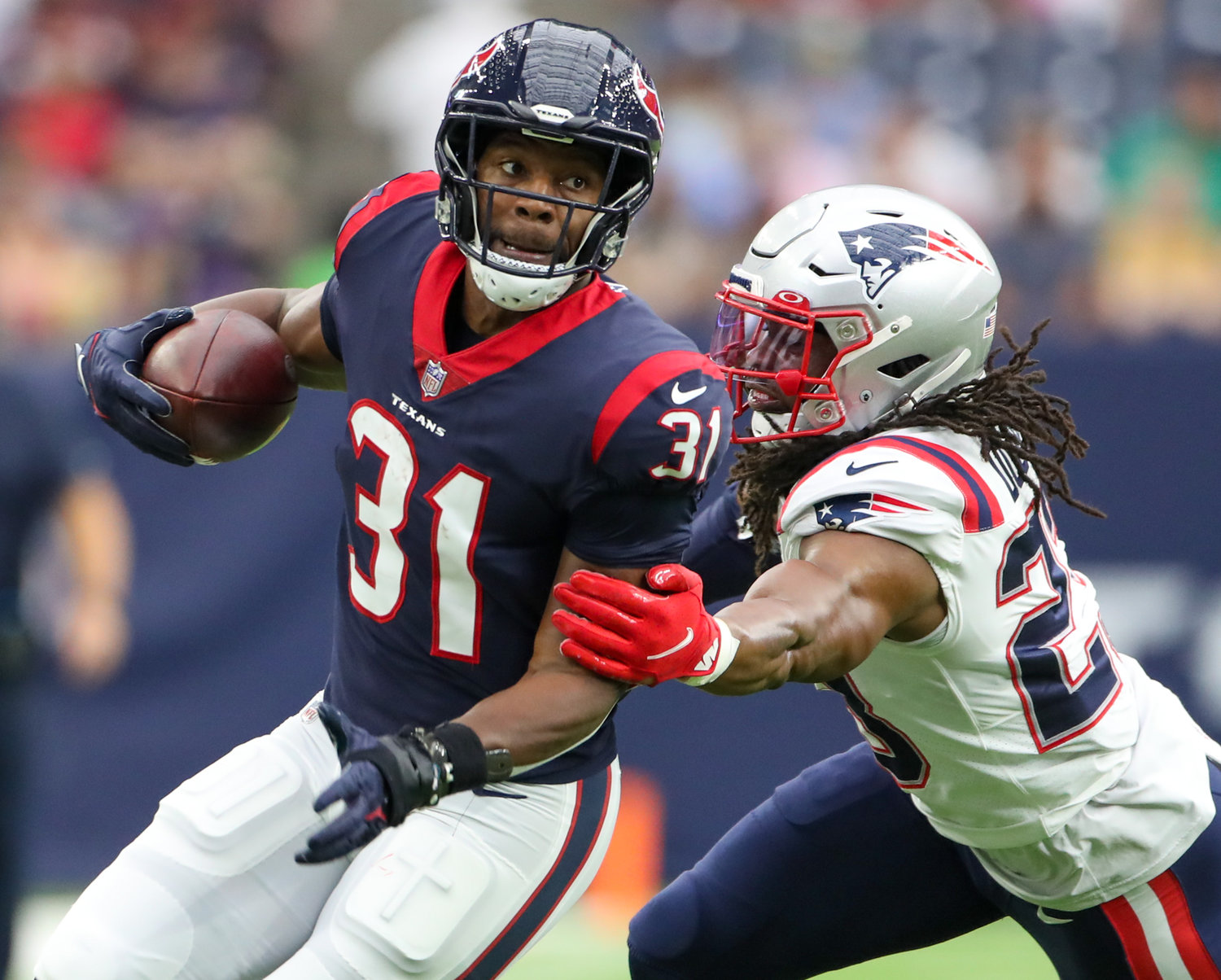 Houston Texans running back David Johnson (31) carries the ball during an NFL game between Houston and New England on October 10, 2021 in Houston, Texas. The Patriots won 25-22.
