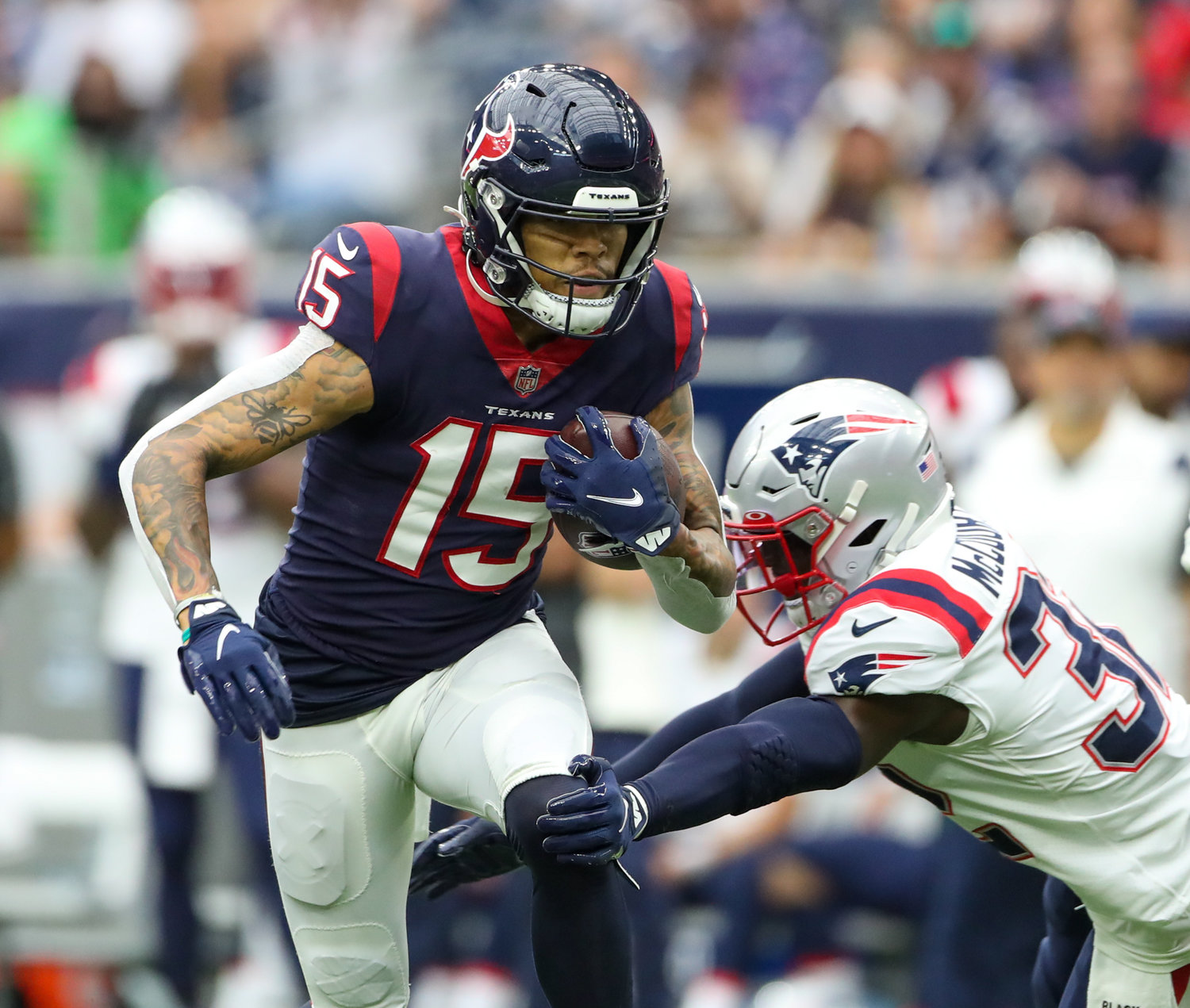 Houston Texans wide receiver Chris Moore (15) carries the ball during an NFL game between Houston and New England on October 10, 2021 in Houston, Texas. The Patriots won 25-22.