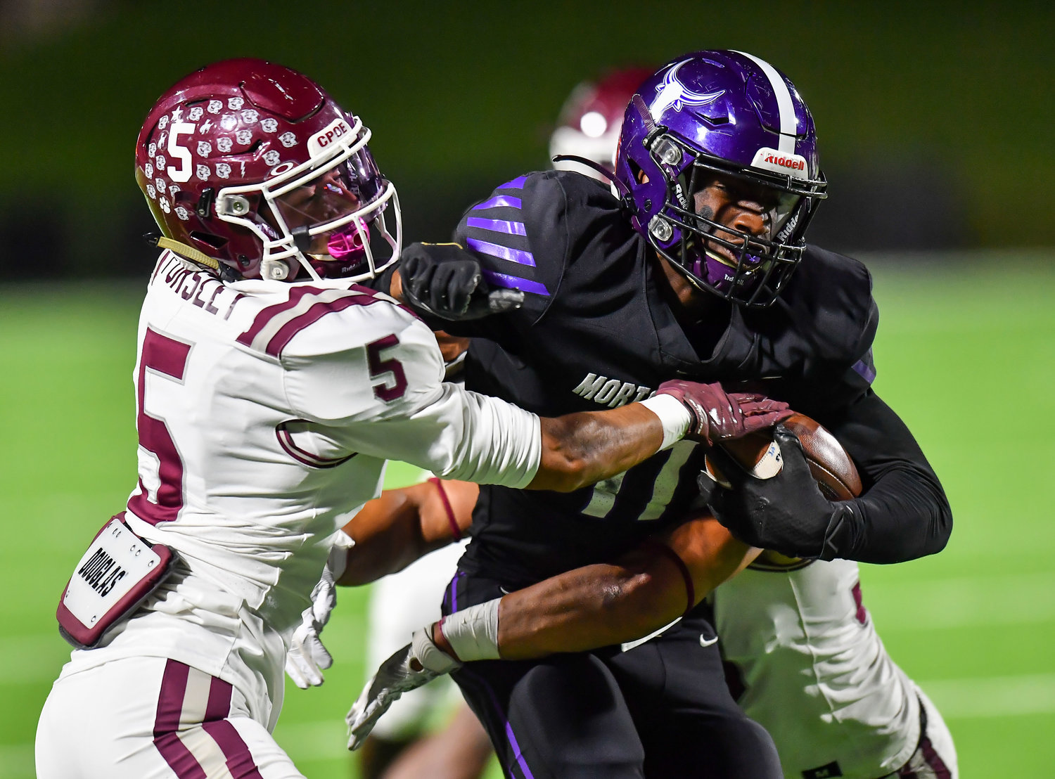 Katy, Tx. Oct. 29, 2021: Cinco Ranch's Jackson Pursley #5 makes the stop on Morton Ranch Josiah Mills #11 during a conference game between Cinco Ranch and Morton Ranch at Rhodes Stadium in Katy. (Photo by Mark Goodman / Katy Times)