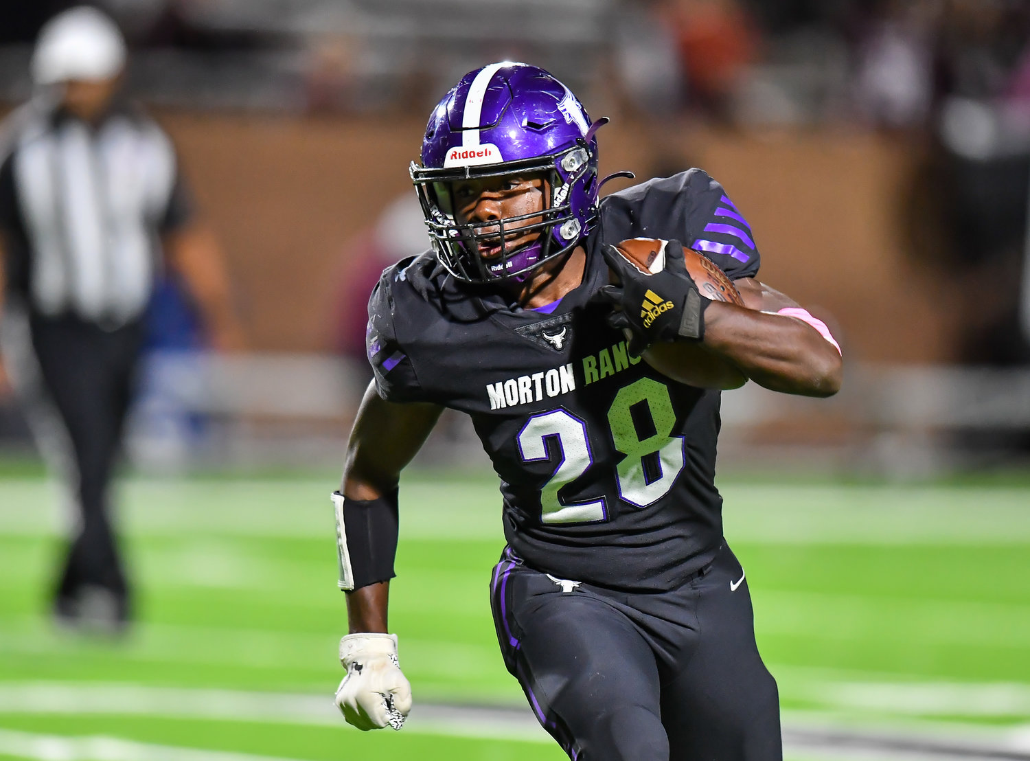 Katy, Tx. Oct 29, 2021: Morton Ranch's  Ryan Hall #28rushes to the outside during a conference game between Cinco Ranch and Morton Ranch at Rhodes Stadium in Katy. (Photo by Mark Goodman / Katy Times)