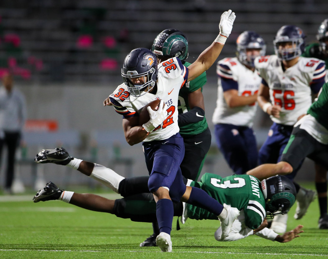 Seven Lakes Spartans running back Michael Amico (32) carries the ball for a touchdown during a high school football game between Mayde Creek and Seven Lakes on October 29, 2021 in Katy, Texas. Seven Lakes won, 50-10.