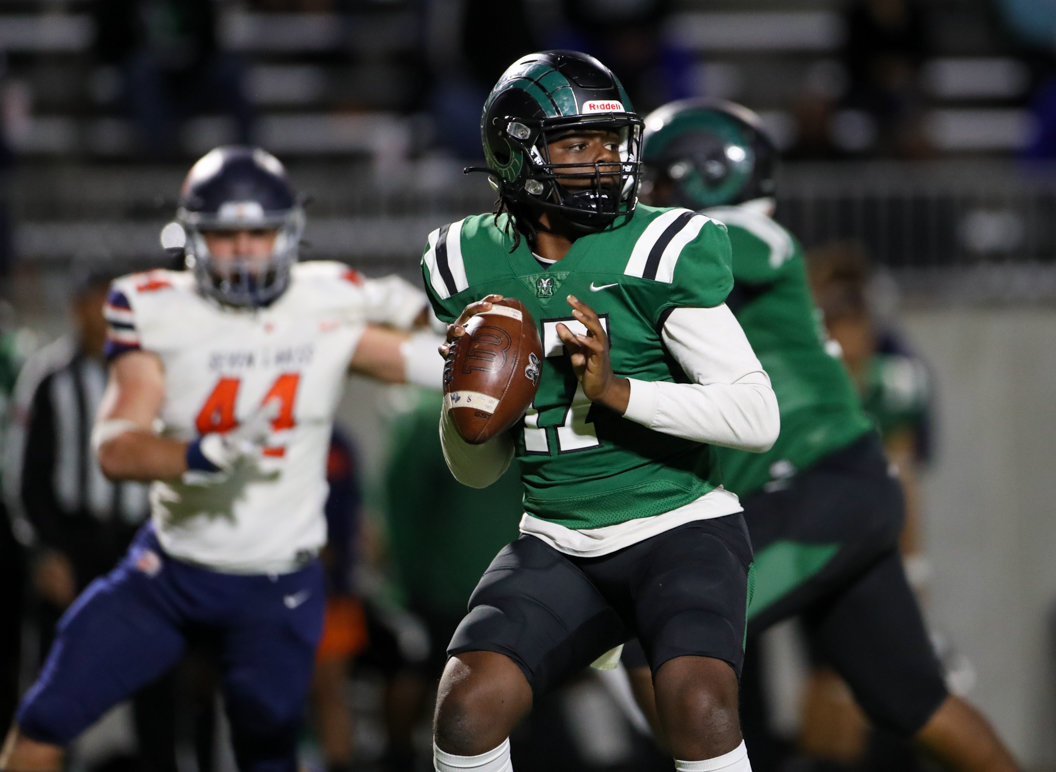 Mayde Creek Rams quarterback Carldell Beard (17) looks to pass during a high school football game between Mayde Creek and Seven Lakes on October 29, 2021 in Katy, Texas. Seven Lakes won, 50-10.