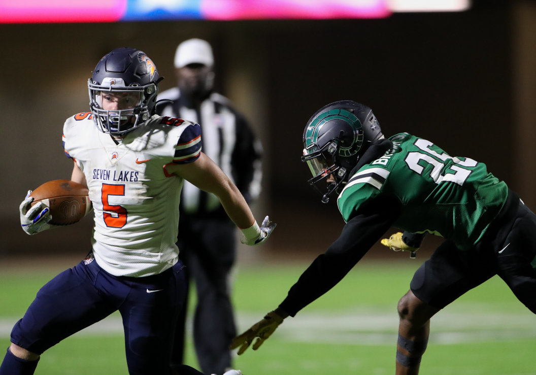 Seven Lakes Spartans running back Barrett Hudson (5) carries the ball during a high school football game between Mayde Creek and Seven Lakes on October 29, 2021 in Katy, Texas. Seven Lakes won, 50-10.