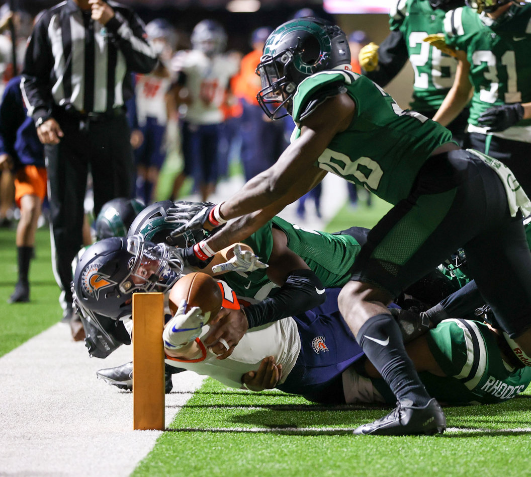 Seven Lakes Spartans running back Barrett Hudson (5) extends the ball across the pylon for a touchdown during a high school football game between Mayde Creek and Seven Lakes on October 29, 2021 in Katy, Texas. Seven Lakes won, 50-10.