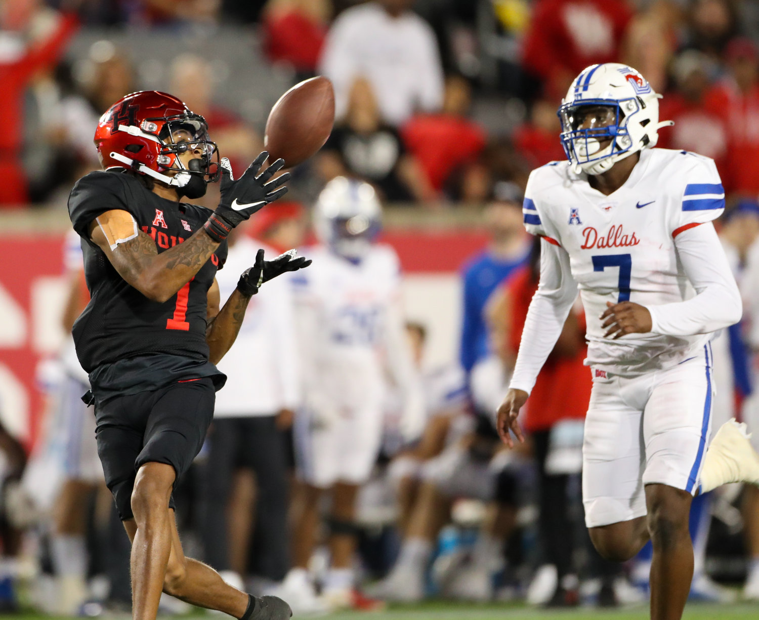Houston Cougars wide receiver Nathaniel Dell (1) makes a catch during an NCAA football game between Houston and SMU on October 30, 2021 in Houston, Texas.
