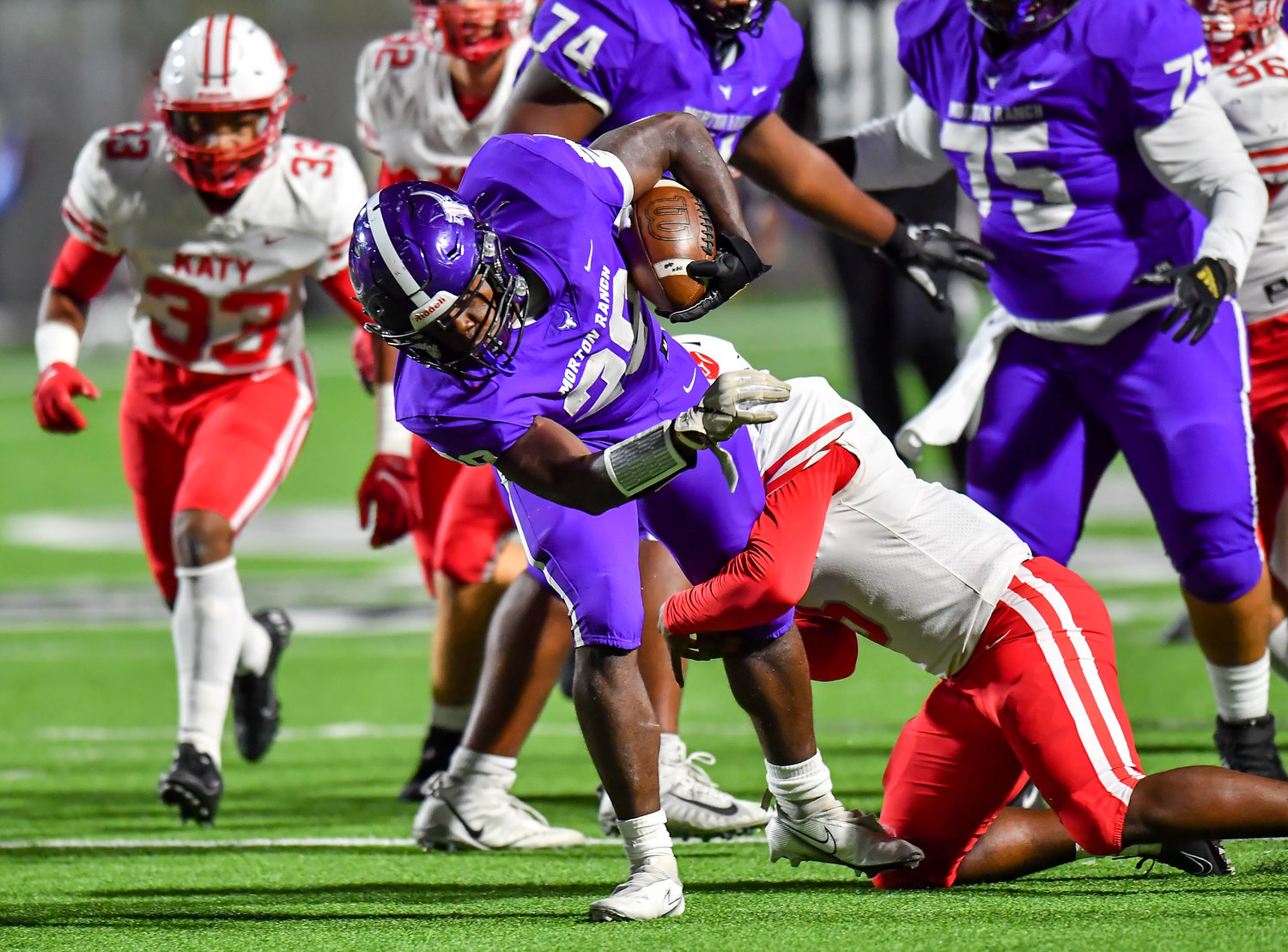 Katy, Tx. Nov 5, 2021: Morton Ranch's Ryan Hall #28 carries the ball during a conference game between Katy and Morton Ranch at Legacy Stadium in Katy. (Photo by Mark Goodman / Katy Times)