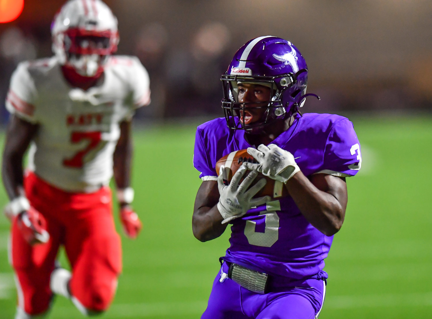 Katy, Tx. Nov 5, 2021:  Morton Ranch's Santana Scott #3 makes the reception in the end zone for a TD during a conference game between Katy and Morton Ranch at Legacy Stadium. (Photo by Mark Goodman / Katy Times)