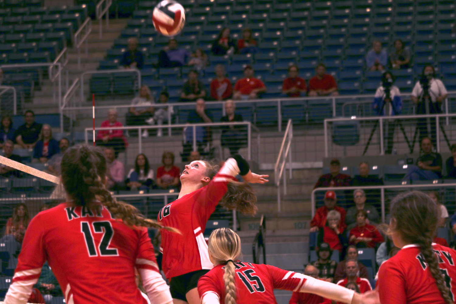 Katy’s Maddie Waak spikes the ball during a regional quarterfinal game at the Merrell Center on Tuesday.