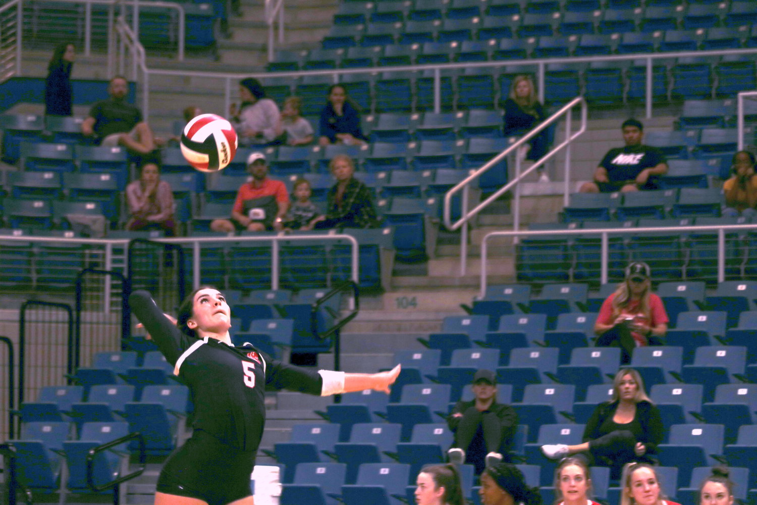 Katy’s Izzy Denton serves during a regional quarterfinal game at the Merrell Center on Tuesday.