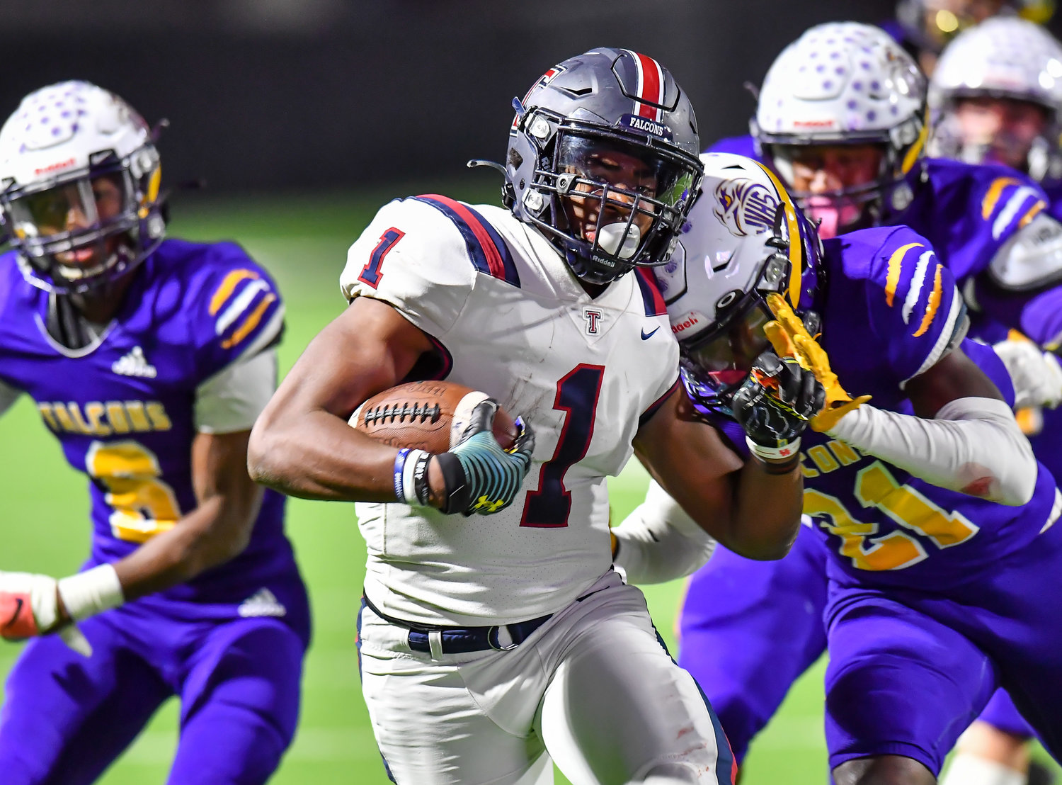 Houston Tx. Nov 19, 2021: Tompkins #1 Caleb Komolafe rushes for a TD during the UIL area playoff game between Tompkins and Jersey Village at Pridgeon Stadium in Houston. (Photo by Mark Goodman / Katy Times)