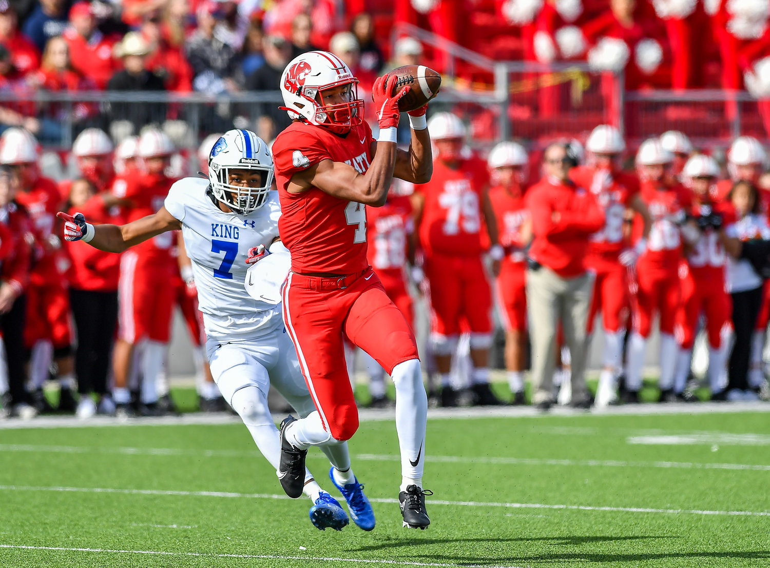 Katy Tx. Nov 26, 2021: Katy's #4 Nic Anderson makes the reception scoring a TD during the first half of the UIL regional playoff game between Katy Tigers and King Panthers at Legacy Stadium in Katy. (Photo by Mark Goodman / Katy Times)