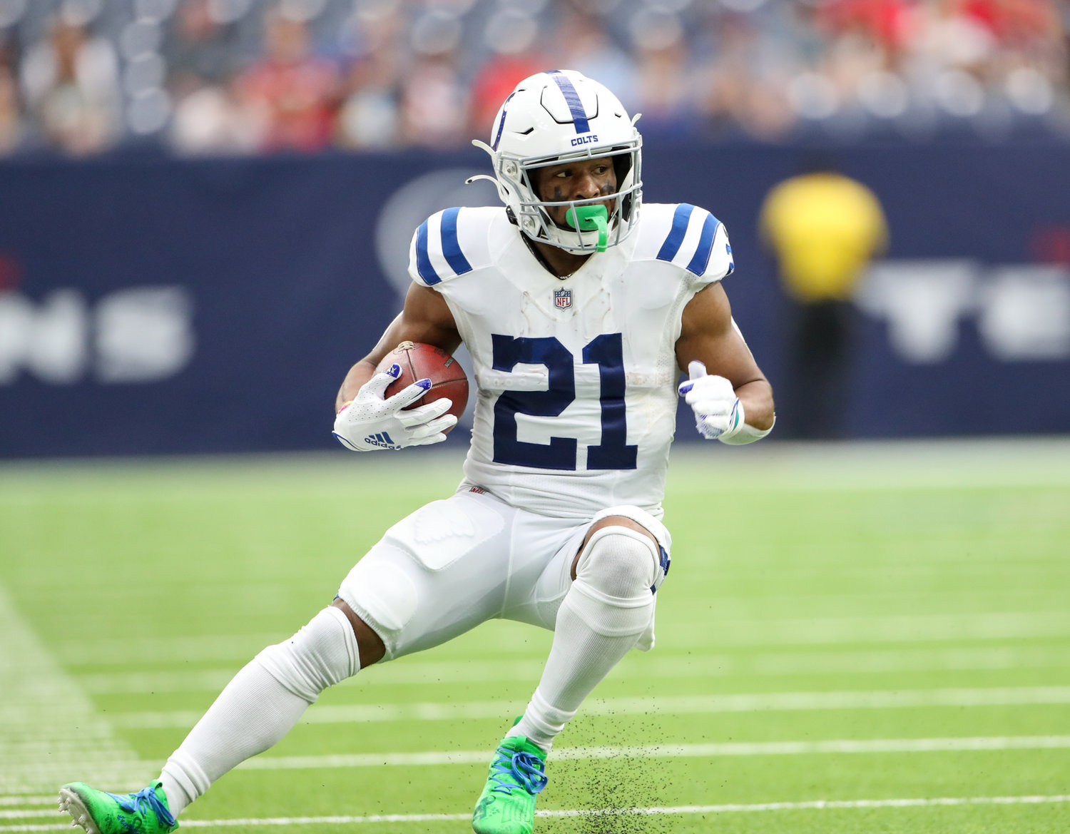 Indianapolis Colts running back Nyheim Hines (21) carries the ball during an NFL game between the Texans and the Colts on December 5, 2021 in Houston, Texas.