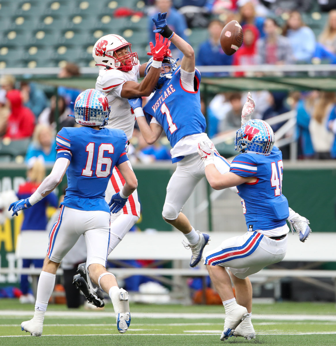 Westlake Chaparrals defensive back Luke Aaron (1) breaks up a pass intended for Katy Tigers wide receiver Nic Anderson (4) during the Class 6A Division II state semifinal  game between Katy and Westlake on December 11, 2021 in Waco, Texas.
