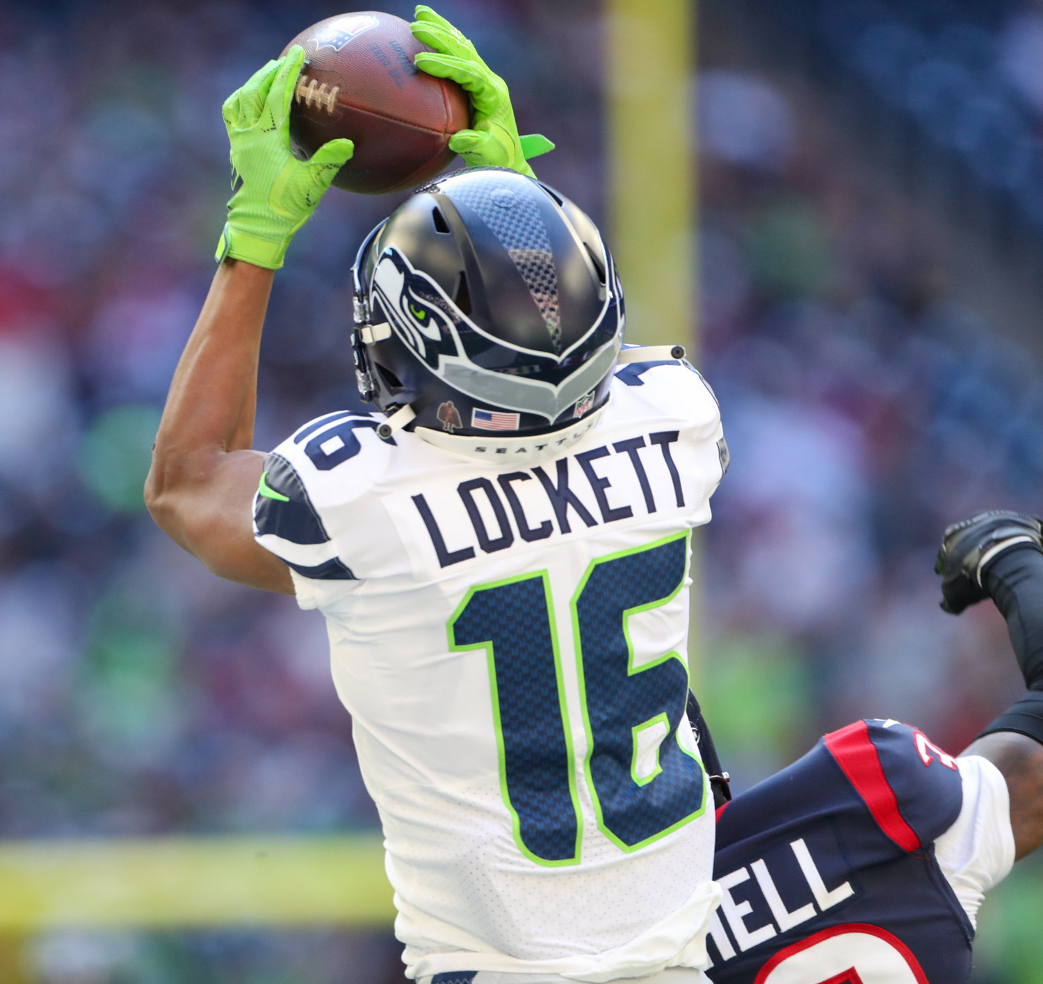 Seattle Seahawks wide receiver Tyler Lockett (16) brings in a pass during the first half of an NFL game between the Seahawks and the Texans on December 12, 2021 in Houston, Texas.