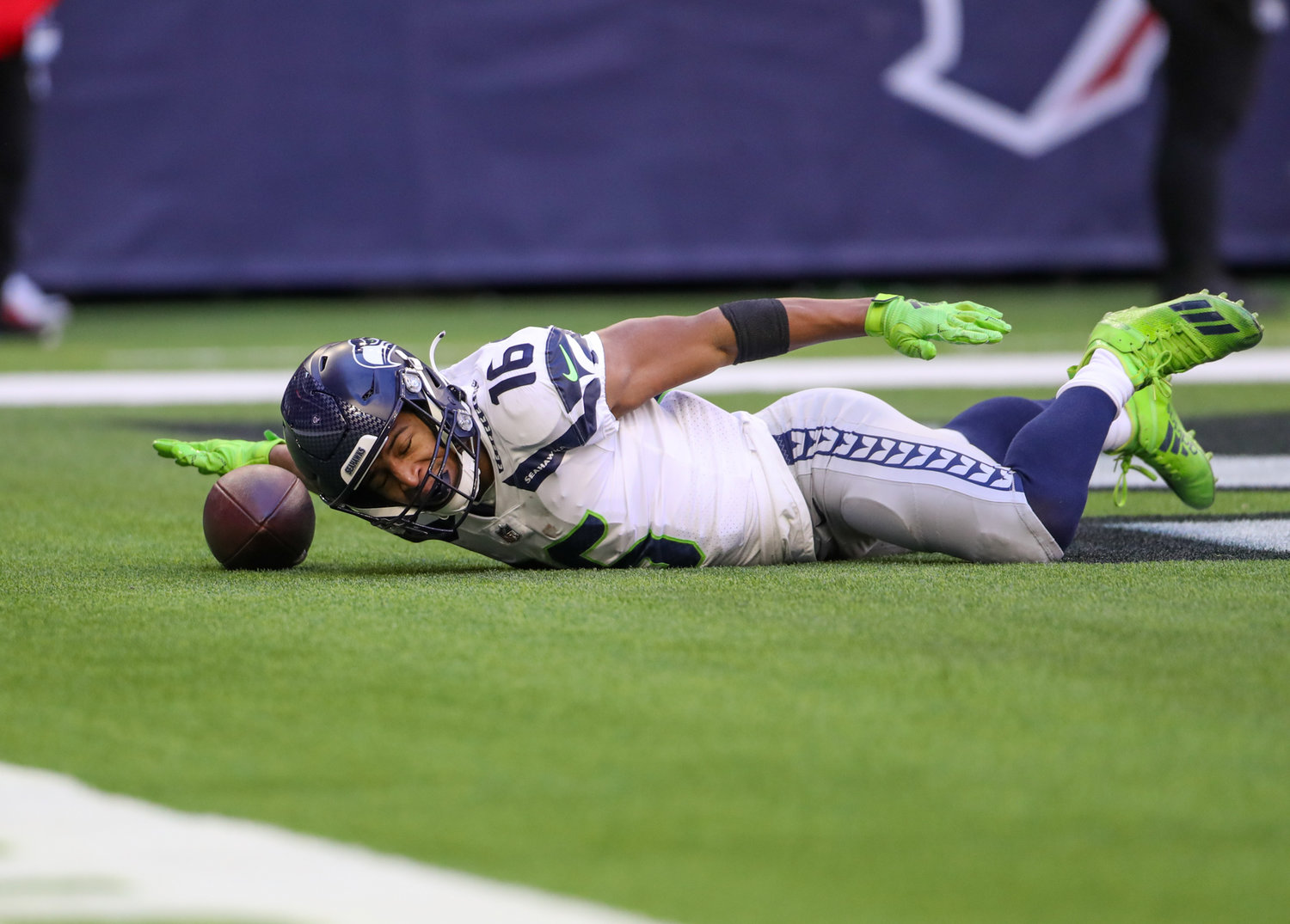 Seattle Seahawks wide receiver Tyler Lockett (16) celebrates after a touchdown catch during the first half of an NFL game between the Seahawks and the Texans on December 12, 2021 in Houston, Texas.