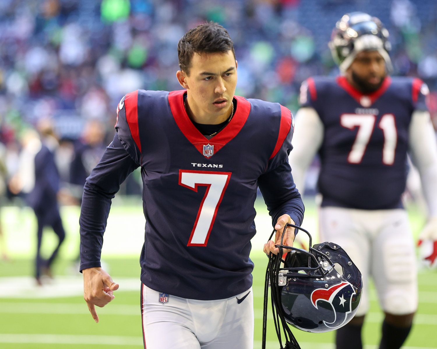 Houston Texans place kicker Ka'imi Fairbairn (7) leaves the field following an NFL game between the Seahawks and the Texans on December 12, 2021 in Houston, Texas. Seattle won, 33-13, but Fairbairn kicked a franchise record 61-yard field goal to end the first half.