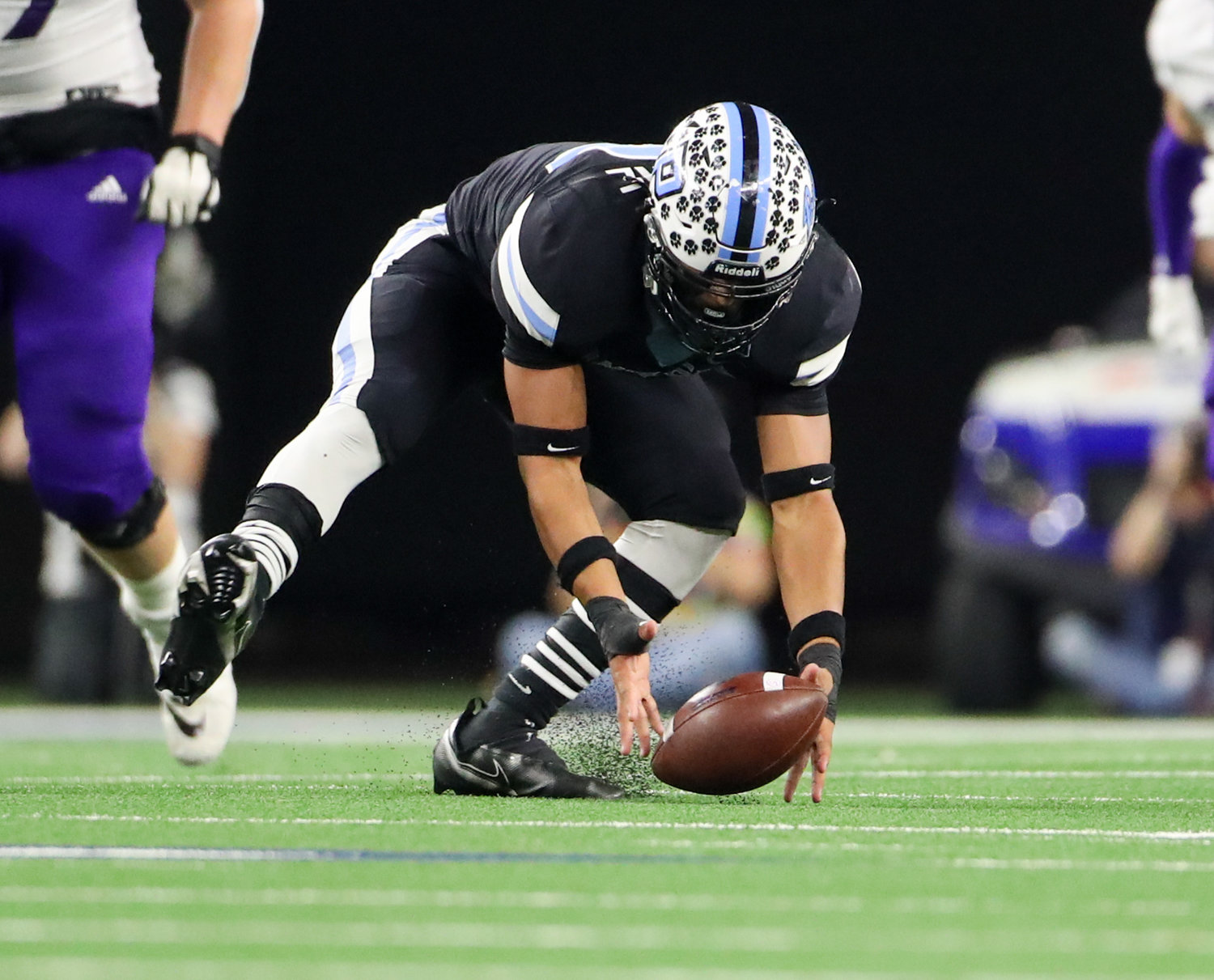 Paetow Panthers linebacker Alex Kilgore (46) picks up and returns a fumble after a strip sack during the Class 5A Division I state football championship game between Paetow and College Station on December 17, 2021 in Arlington, Texas.
