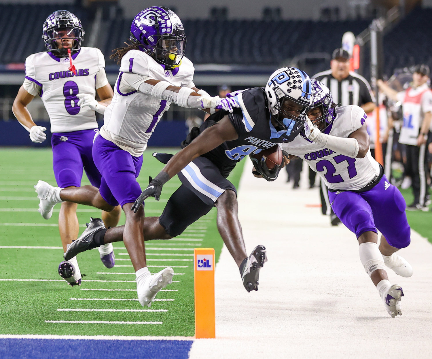 Paetow Panthers wide receiver Brandon Shanks (81) is driven out of bounds after a catch during the Class 5A-Division I state football championship game between Paetow and College Station on December 17, 2021 in Arlington, Texas.