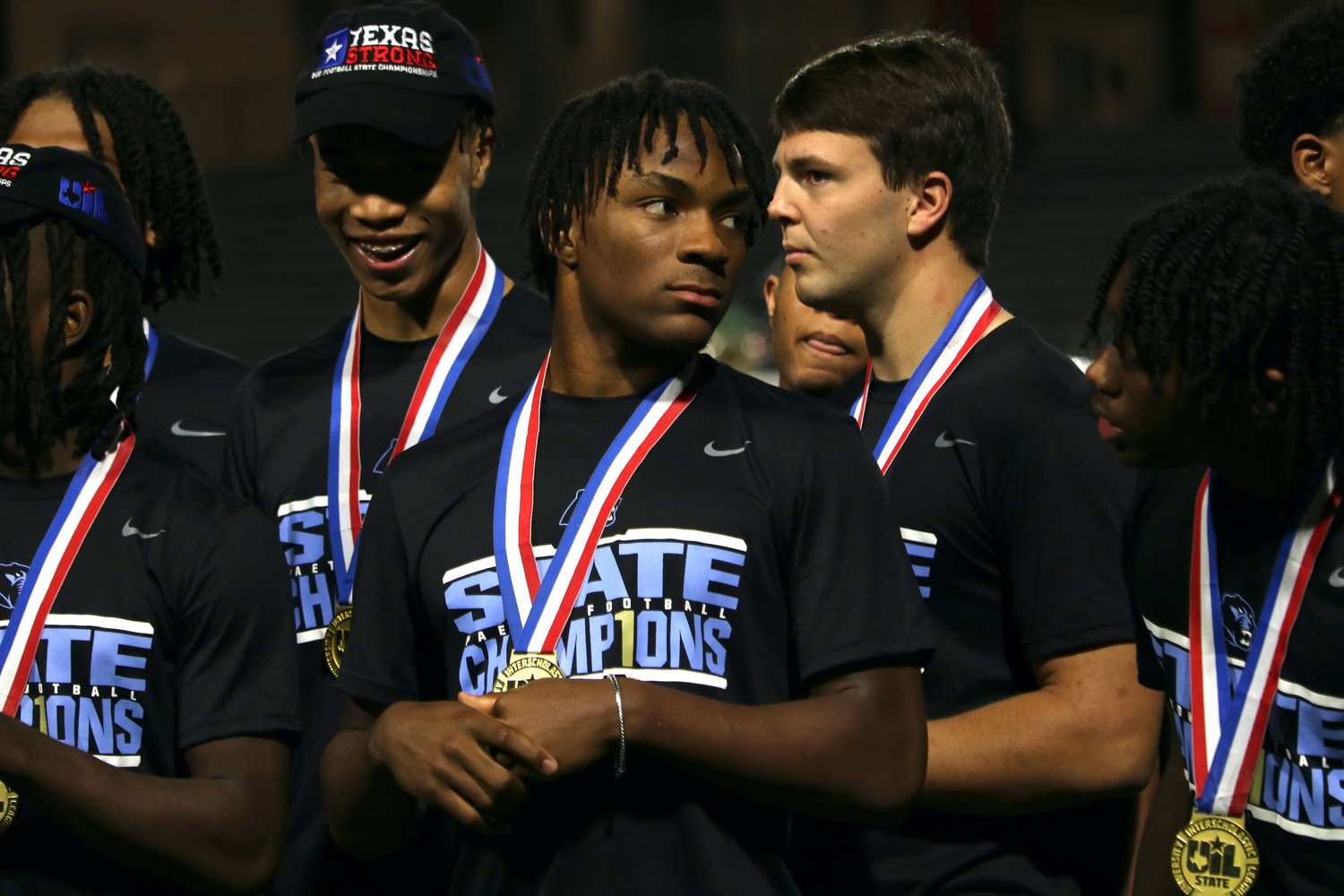Kentrell Webb talks to his teammates during Wednesday's Paetow State Championship celebration at Legacy Stadium