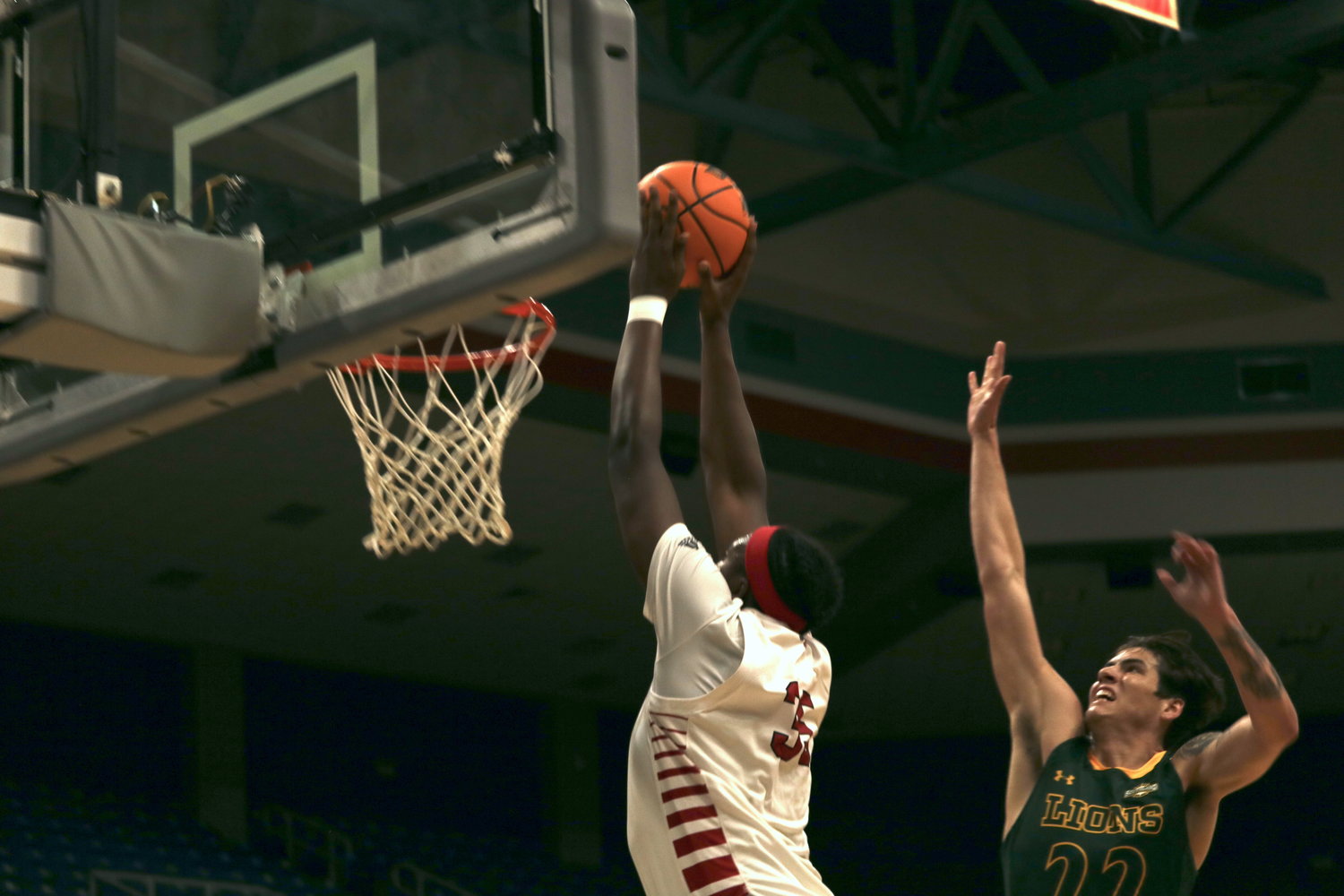 Ryghe Lyons goes up for a dunk attempt during Saturdays Southland Tip-Off Final between Southeastern Louisiana University and Nicholls State University at the Merrell Center.