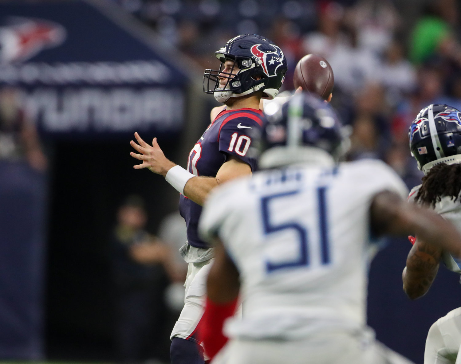 Houston Texans quarterback Davis Mills (10) throws a touchdown pass to Danny Amendola in the fourth quarter of an NFL game between the Texans and the Titans on Jan. 9, 2022 in Houston, Texas.