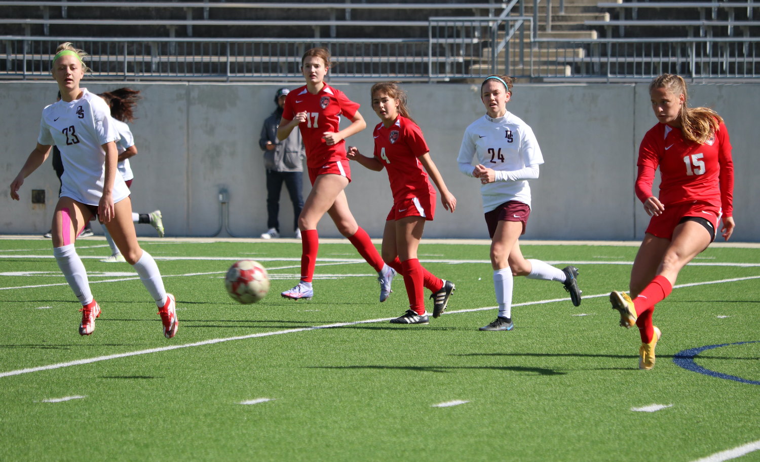Anna Kneisley passes the ball during a game between Katy and Dripping Springs at Legacy Stadium on Saturday.
