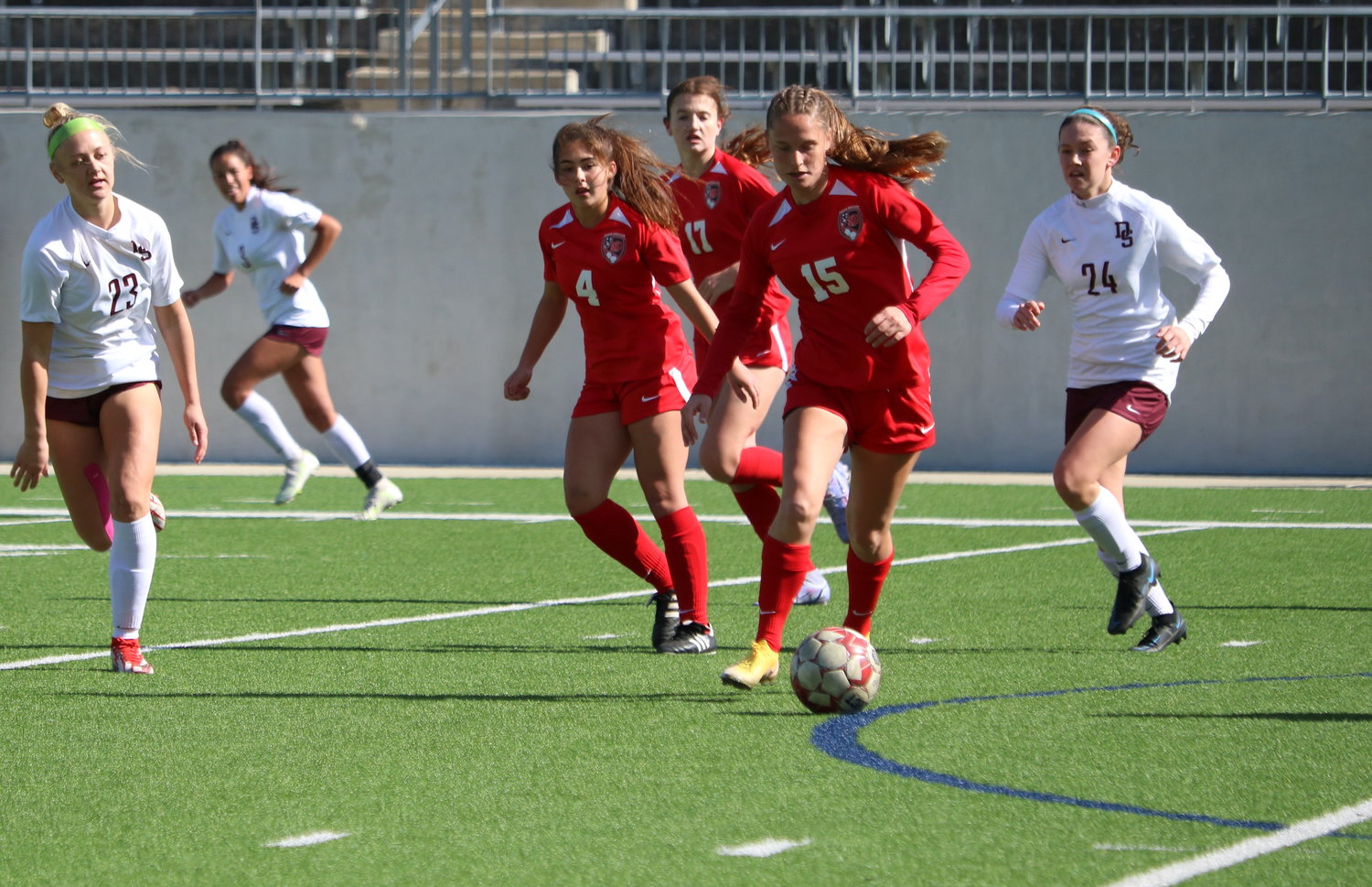 Anna Kneisley dribbles the ball during a game between Katy and Dripping Springs at Legacy Stadium on Saturday.