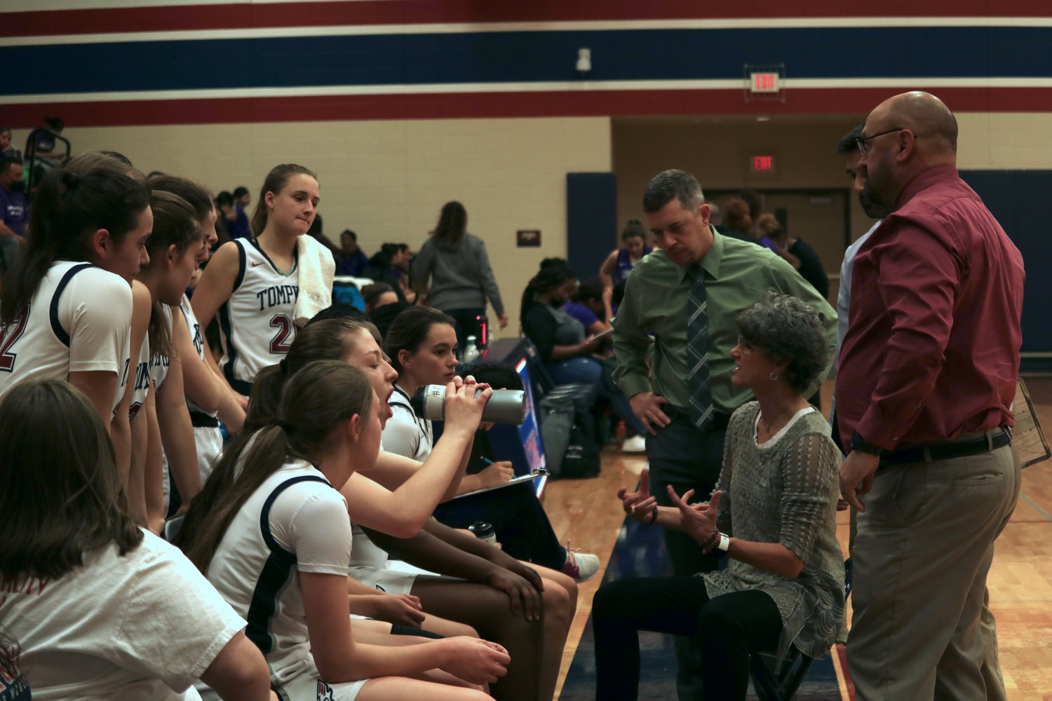 Tompkins head coach Tammy Ray talks to her team during a timeout during Friday’s game against Morton Ranch at the Tompkins gym.