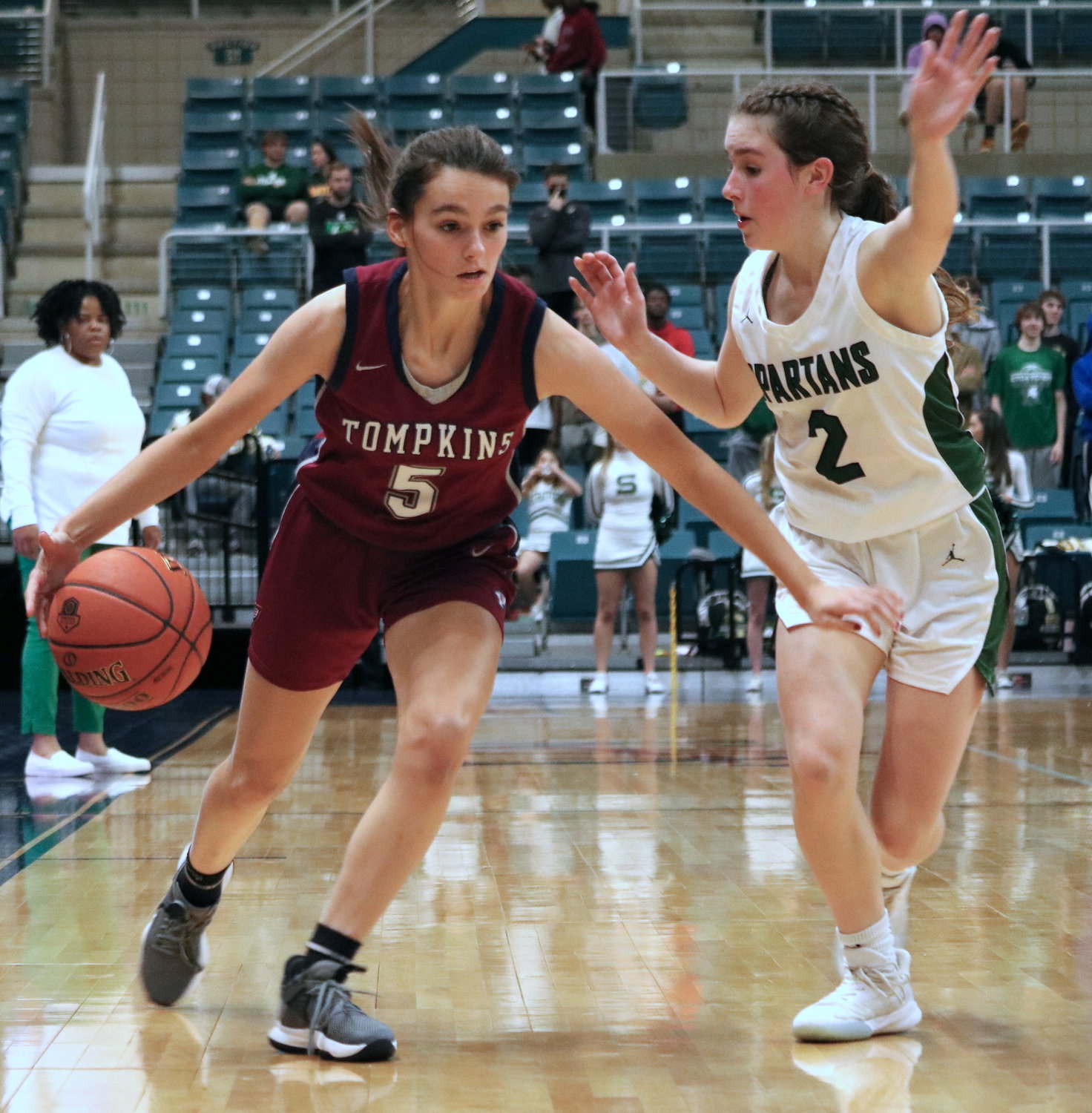 Kayla Boven dribbles past a defender during Friday’s game between Tompkins and Stratford at the Merrell Center.