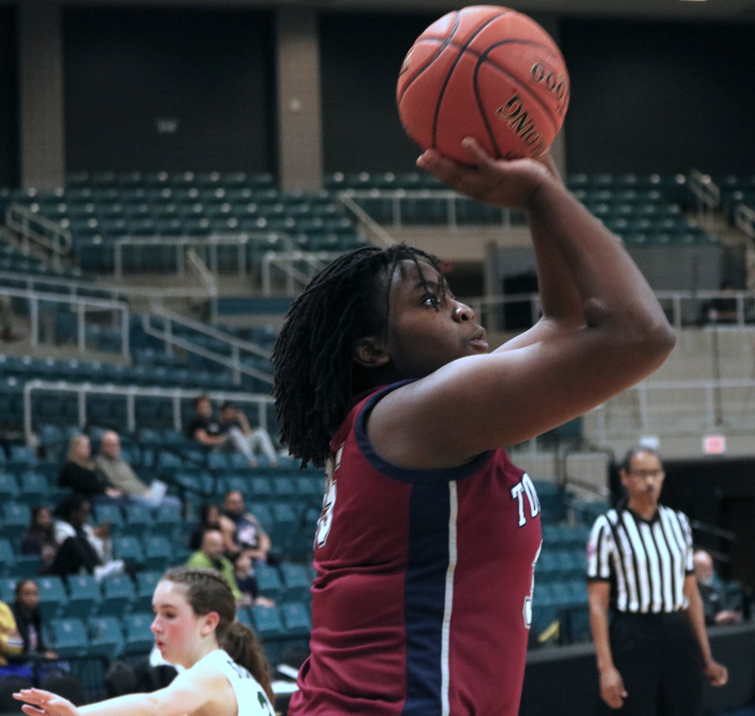 Fiyin Adeleye shoots a shot during Friday’s game between Tompkins and Stratford at the Merrell Center.
