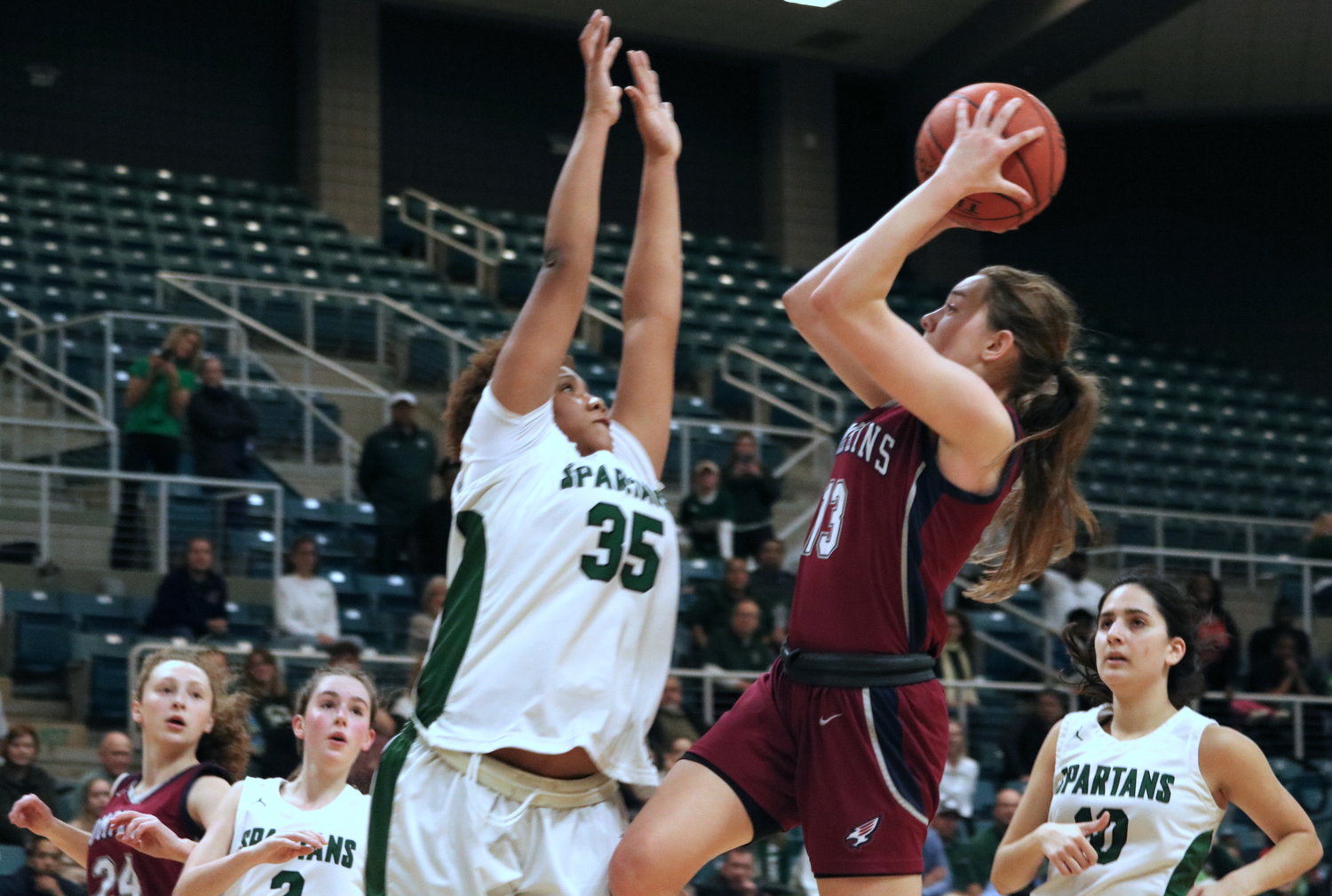 Macy Spencer shoots over a defender during Friday’s game between Tompkins and Stratford at the Merrell Center.