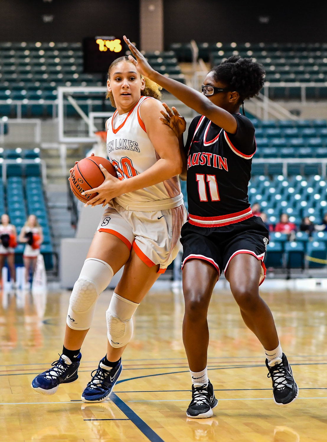 Katy Tx. Feb 22, 2022:  Seven Lakes Justice Carlton #30 drives up the lane to the basket during the Regional Quarterfinal playoff game, Seven Lakes vs Fort Bend Austin at the Merrell Center. (Photo by Mark Goodman / Katy Times)