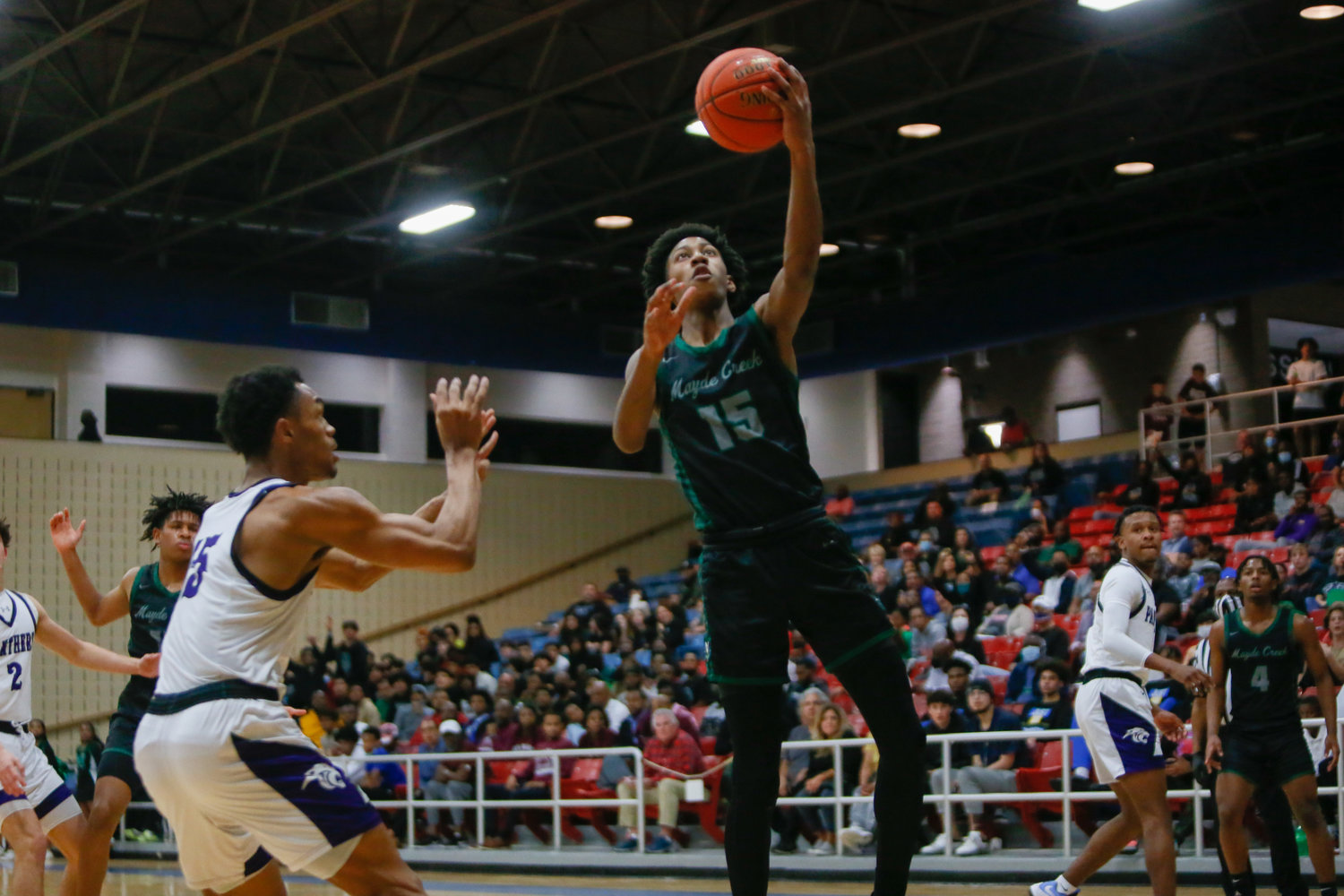 Jamal Chretien II shoots a layup during Tuesday's game against Ridge Point.