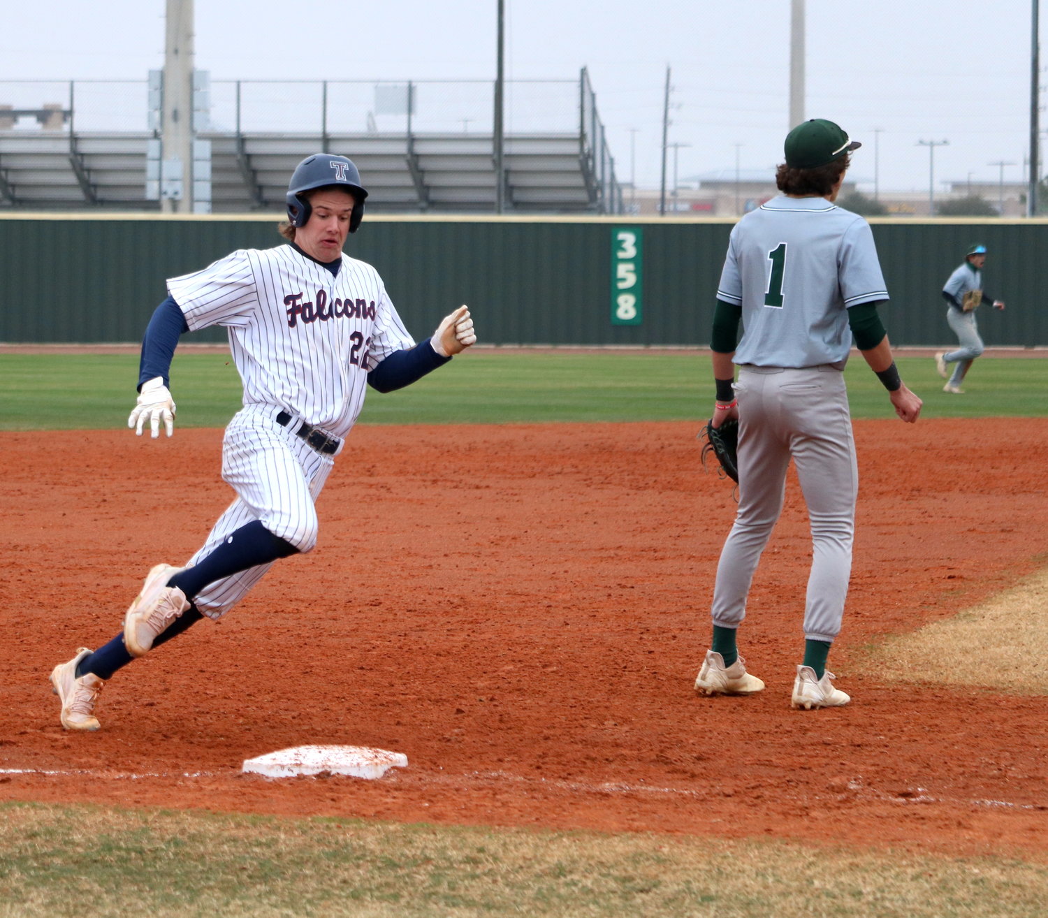 Jack Little rounds third base during Thursday’s game between Tompkins and San Antonio Reagan at the Tompkins baseball field.