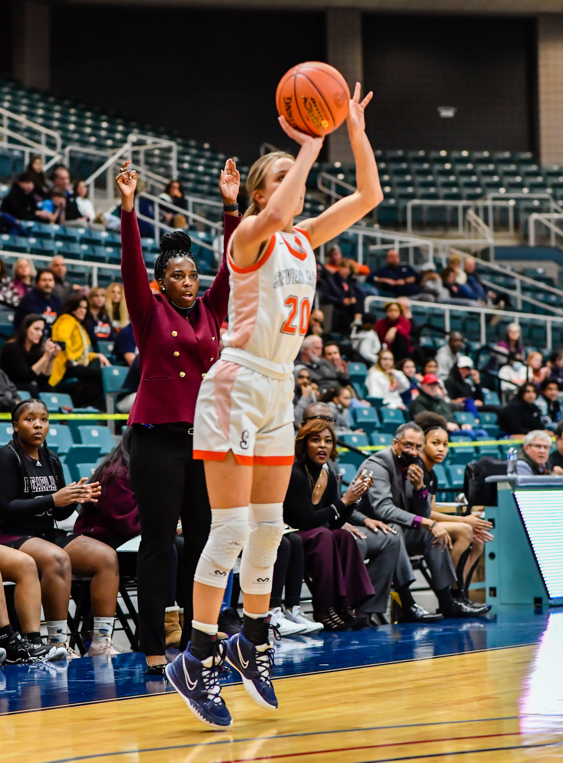 Katy Tx. Feb 25, 2022:  Seven Lakes Summer Halphen #20 goes up for the three point attempt during the Regional SemiFinal playoff game, Seven Lakes vs Pearland at the Merrell Center. (Photo by Mark Goodman / Katy Times)
