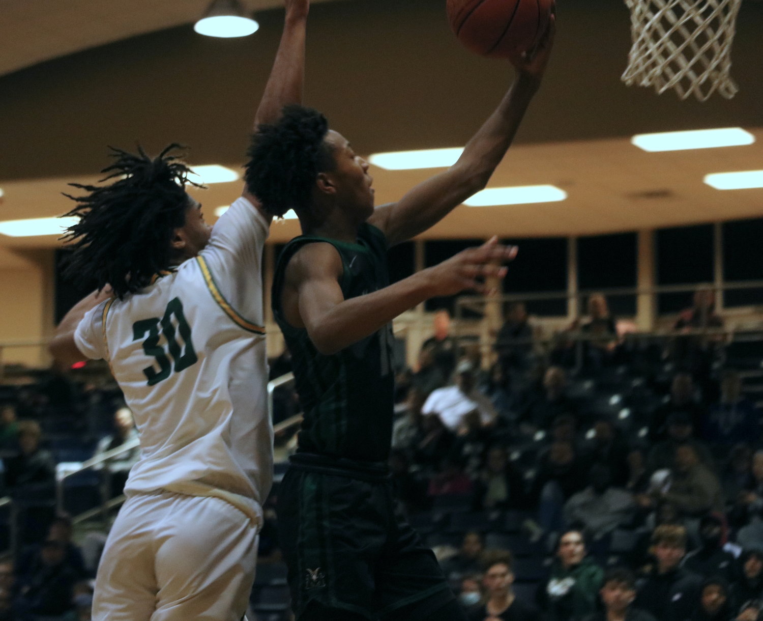 Jamal Chretiene II shoots a layup during Friday’s game between Mayde Creek and Stratford at the Coleman Coliseum.