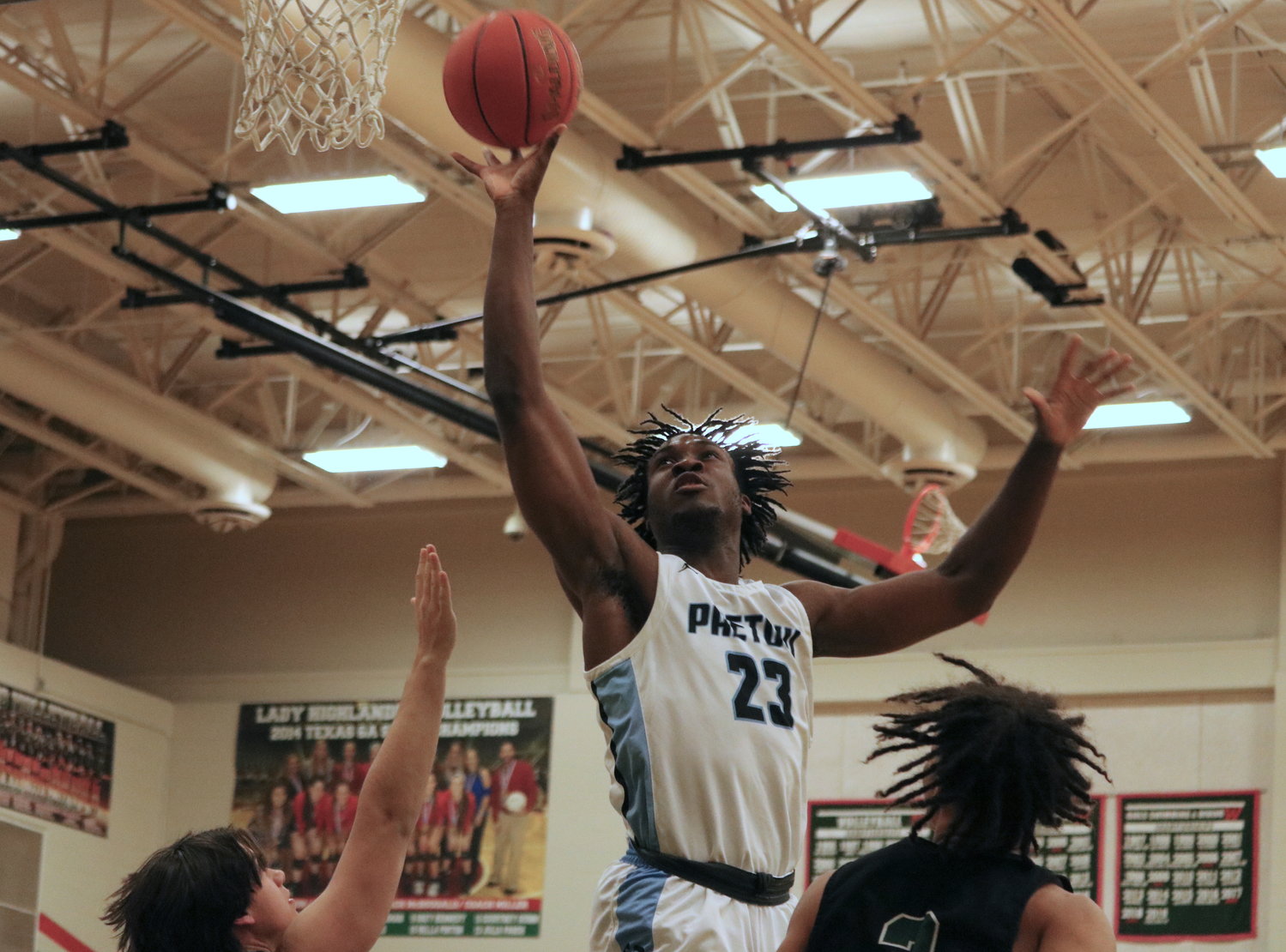 Charles Chukwu shoots a layup during Monday’s game between Paetow and Kingwood Park at The Woodlands High School.